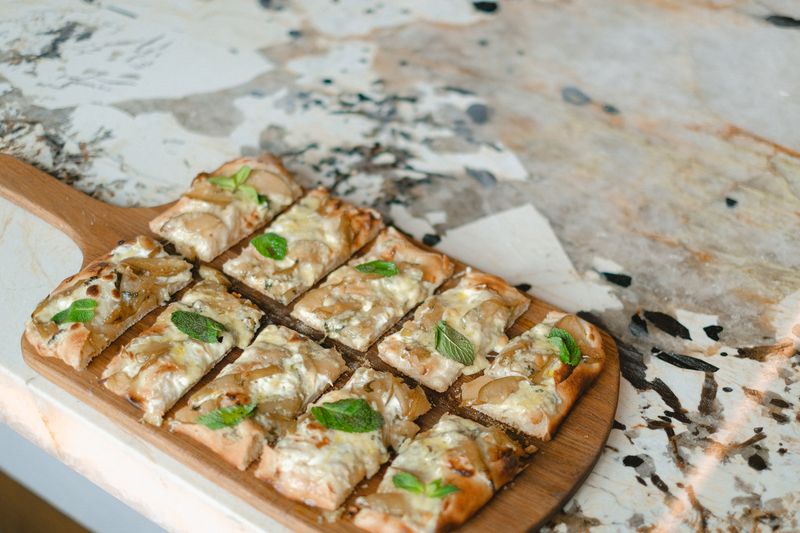 Four Cheese White pizza with ricotta and parmesan