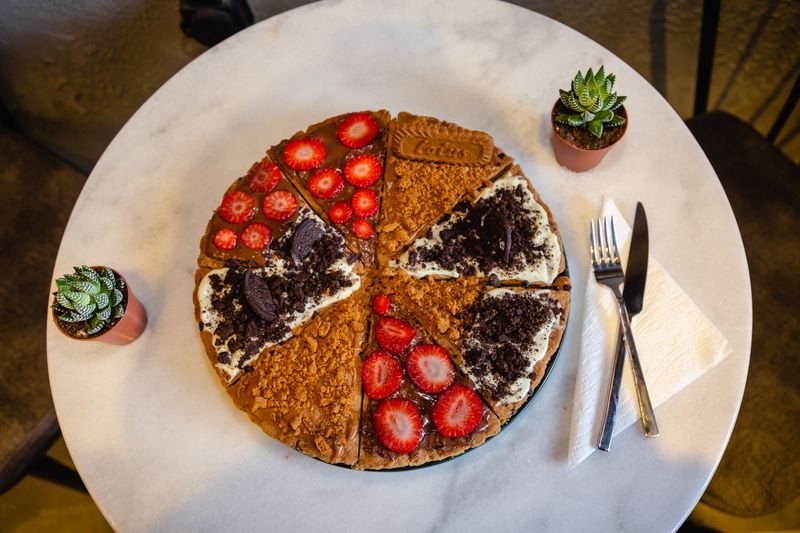 Nutella Dessert Pizza with strawberries and powdered sugar